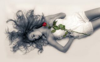 young girl, rose, lying